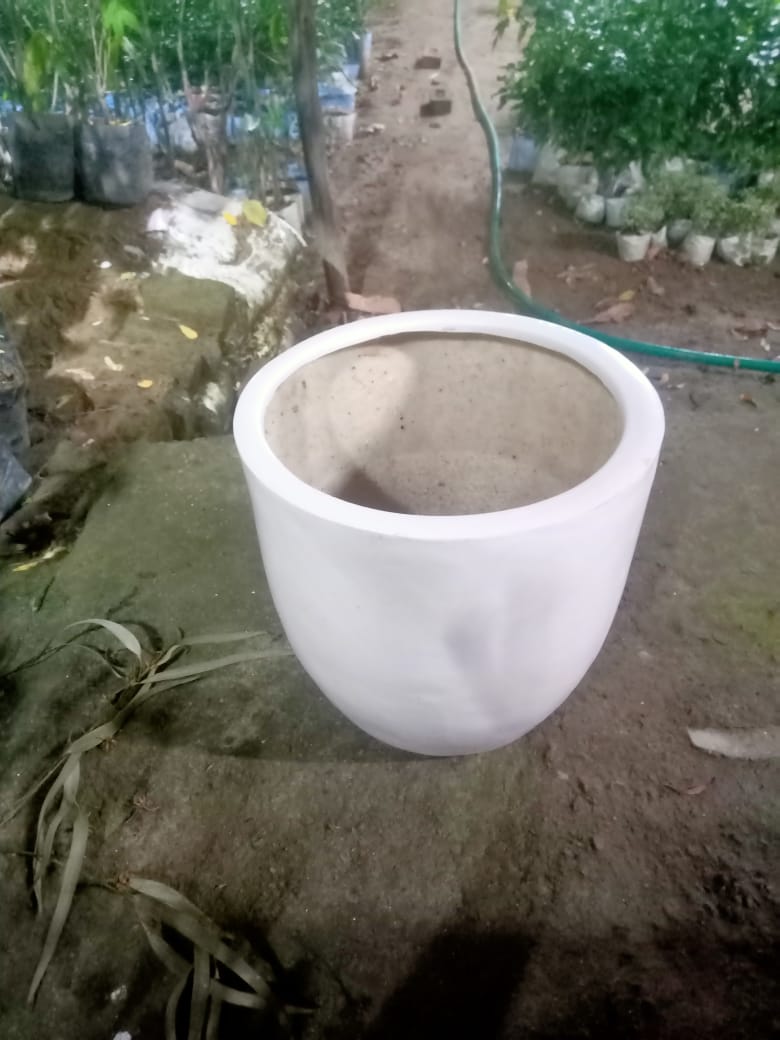 Eco-friendly fiber pot for plants, Biodegradable plant container in natural fiber, Fiber gardening pot for sustainable planting, Green gardening with a fiber pot, Sustainable fiber pot for potted plants